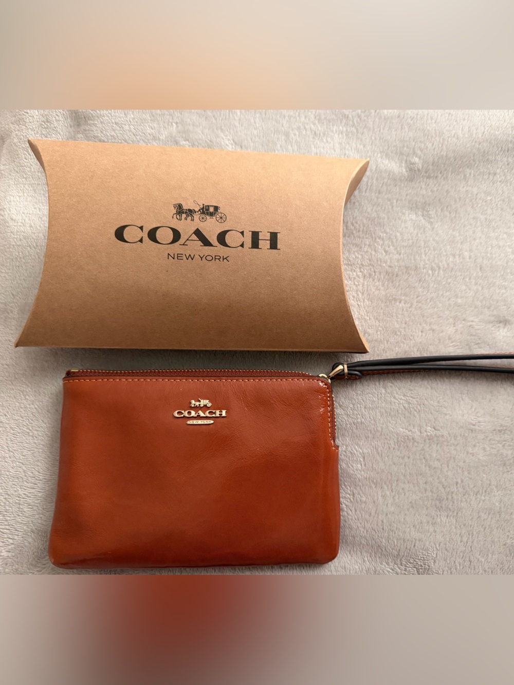 Coach Leather Wristlet in Cognac Brown with Gold Logo